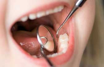 Lisiane Battistini Santos Odontopediatria - Foto 1